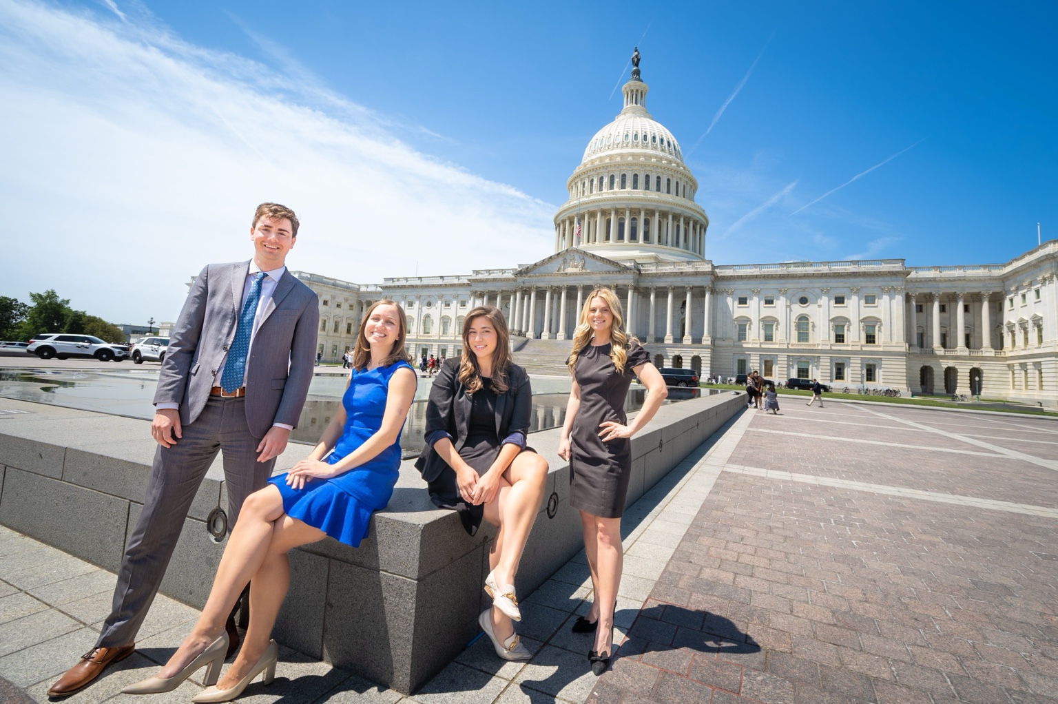 Professional team gathered outside the United States Capitol